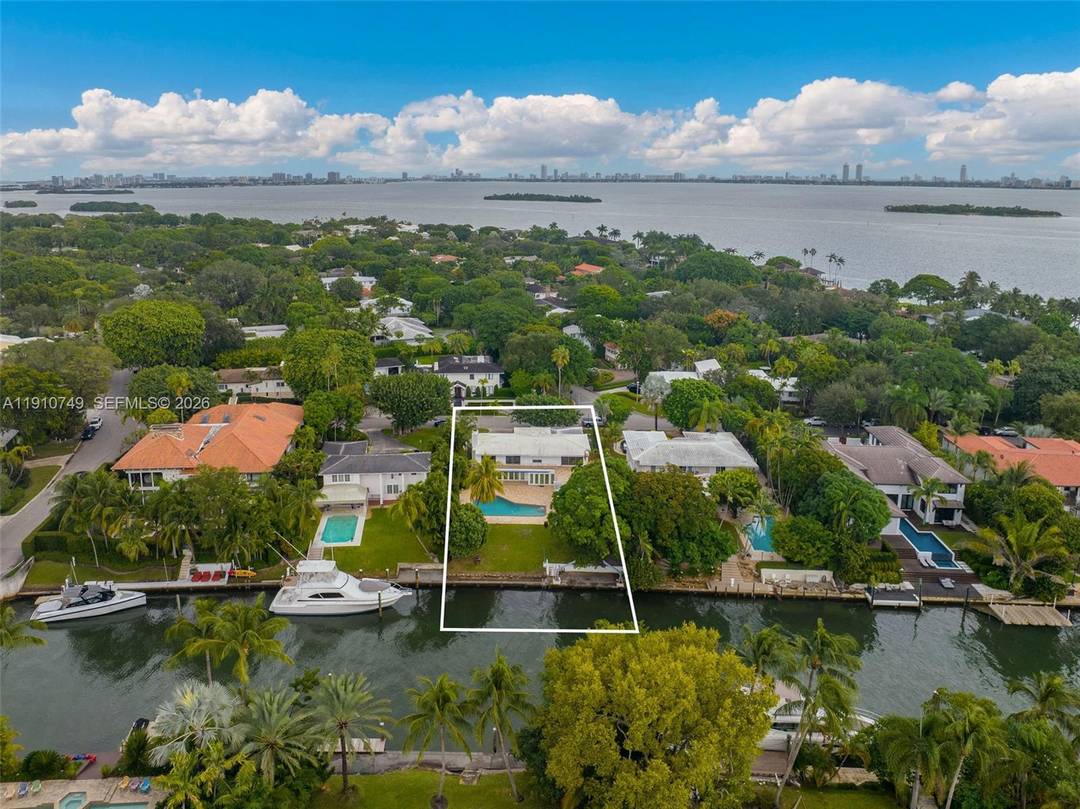 Rarely available waterfront property in a prime location within the prestigious, guard gated Bay Point community.