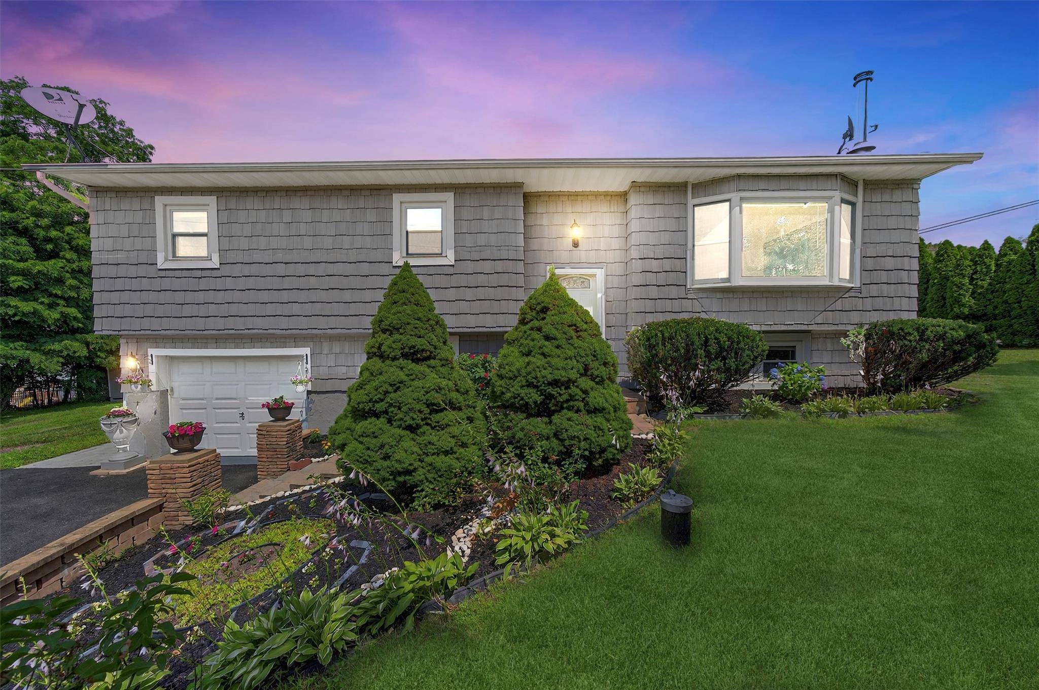 Welcome to 13 Dragotta Road, a beautifully maintained raised ranch offering the perfect blend of comfort, charm, and convenience in the heart of Marlboro.