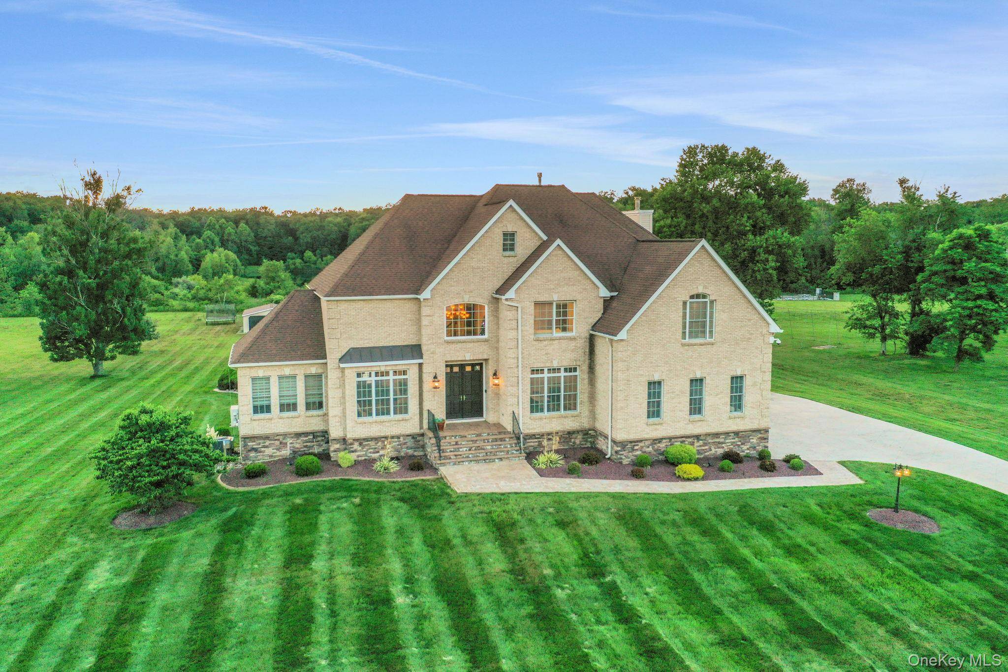 Discover the epitome of elegance in this timeless four bedroom, six bathroom estate, just over one hour from NYC via the George Washington Bridge.
