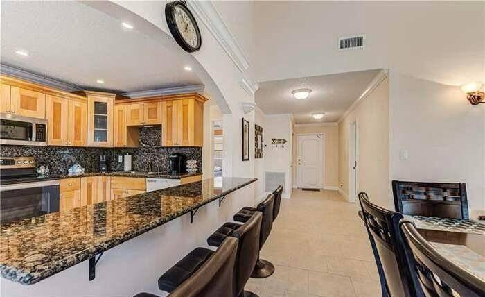 This 3 bedroom 2 bathroom condo in Woodmont offers a serene and peaceful water view, with spacious layout, walk in closets, and vaulted ceilings.