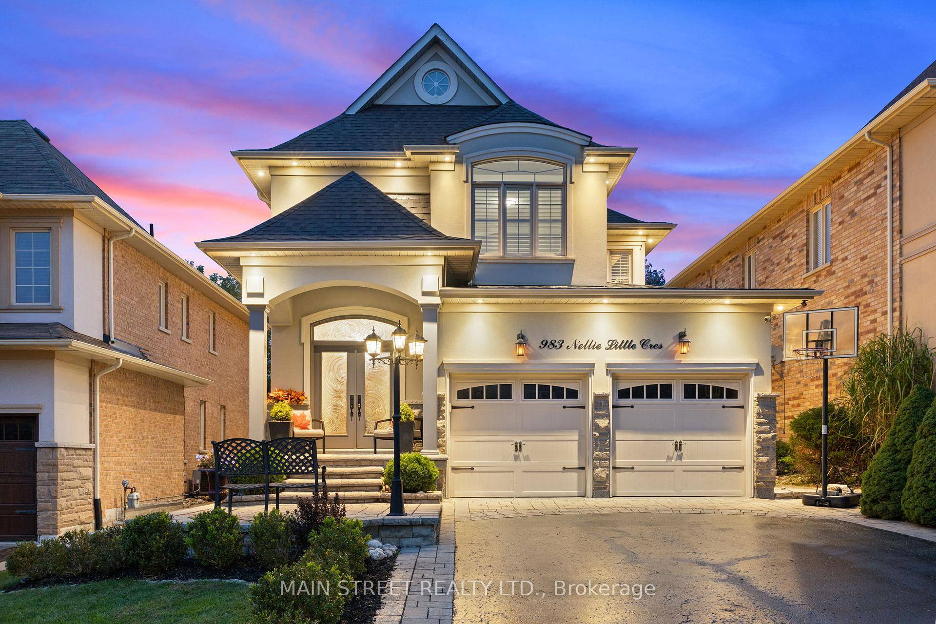 Beautifully updated home on a highly sought after street backing onto green space !
