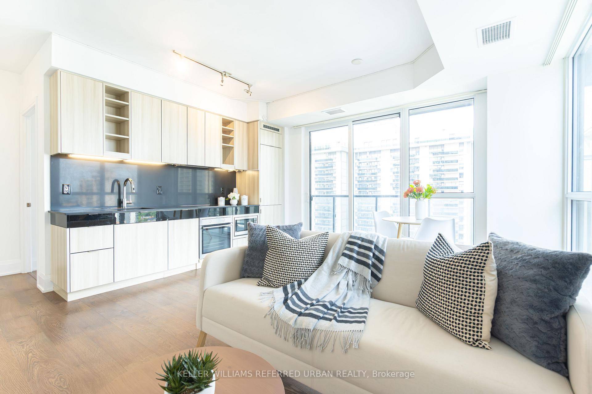 HEART OF Midtown Toronto Yonge Eglinton Luxury 2Br 9' Ceilings Open Concept, Floor to Ceiling windows, Corner unit, LED Lighting strips, Ambient lighting Trendy Designer Laminate Track lighting Kitchen Designer ...