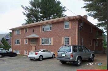 Extremely rare 7 unit brick apartment building.