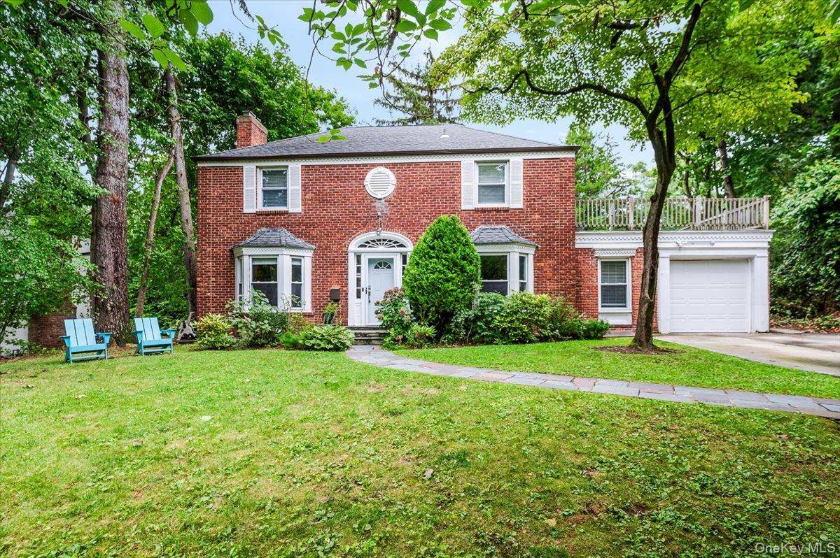 Welcome to this sunlit all brick center hall colonial located in the heart of Great Neck Village.