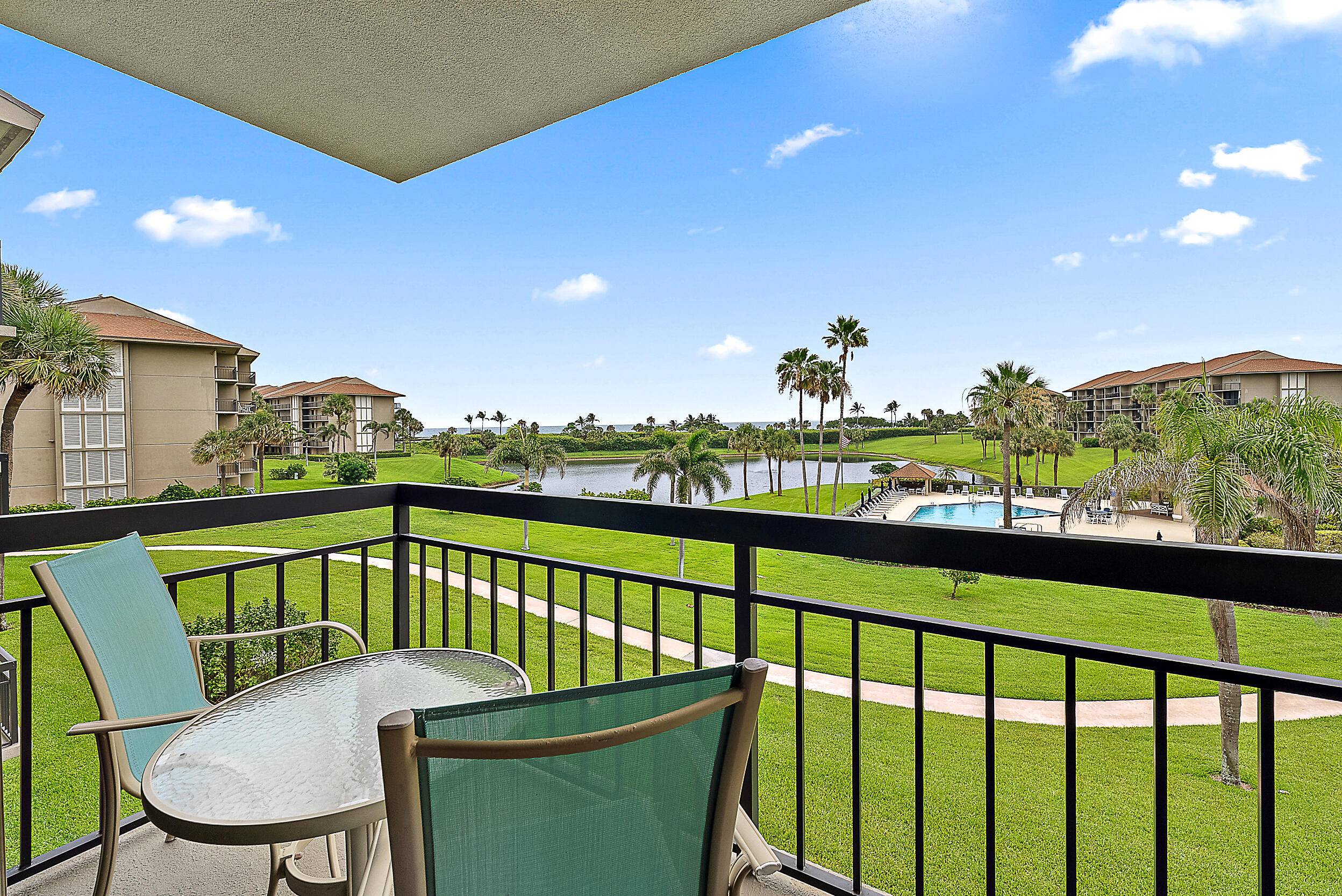 Enjoy stunning ocean, lake, and pool views from this beautifully updated condo in Ocean at the Bluffs.