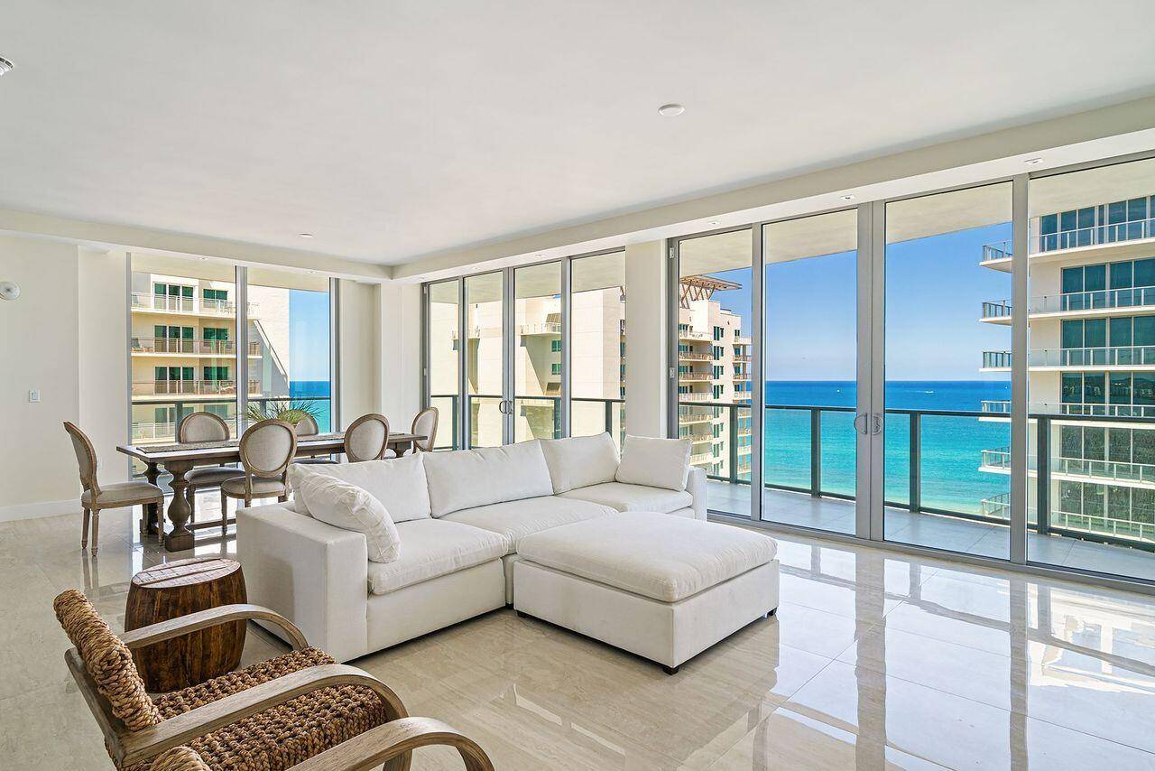 Premium upper floor corner unit with both sunrise and sunset outdoor terraces.