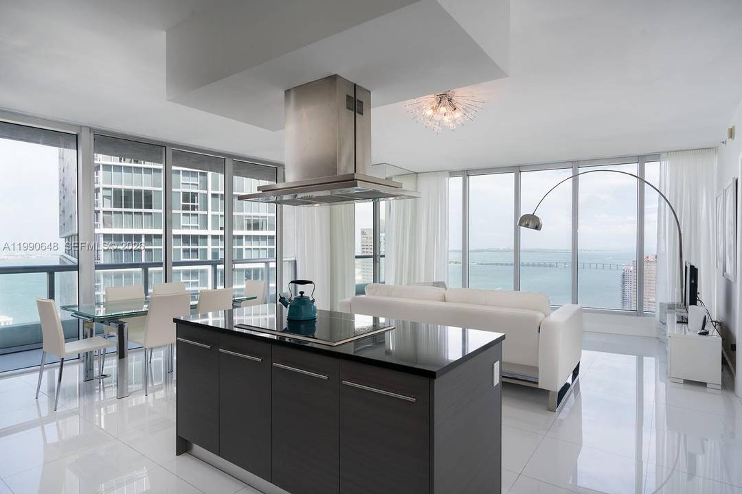 Spectacular 2 beds, 2 baths residence on the 41st floor of Icon Brickell with sweeping views of Biscayne Bay, the Miami River, and the city skyline.