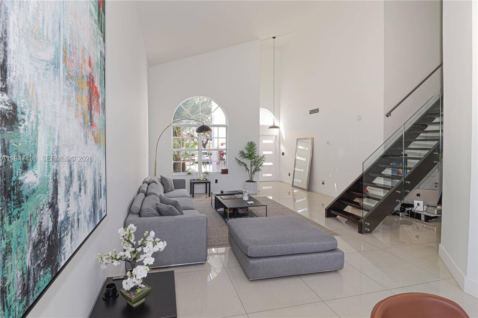 Beautiful two story single family home located in the prestigious Doral Isles Oasis community.