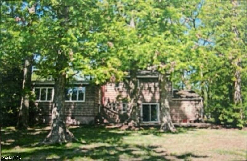 Located in the desirable Collins area, this split level home offers 4 bedrooms, 2 full bathrooms, and a spacious 0.