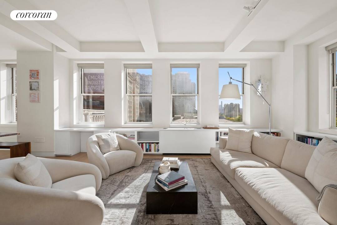 Tribeca loft proportions meet full service amenities in this sun drenched three bedroom, two bathroom condominium featuring an expansive open plan layout, sleek modern finishes, and breathtaking City Hall views ...