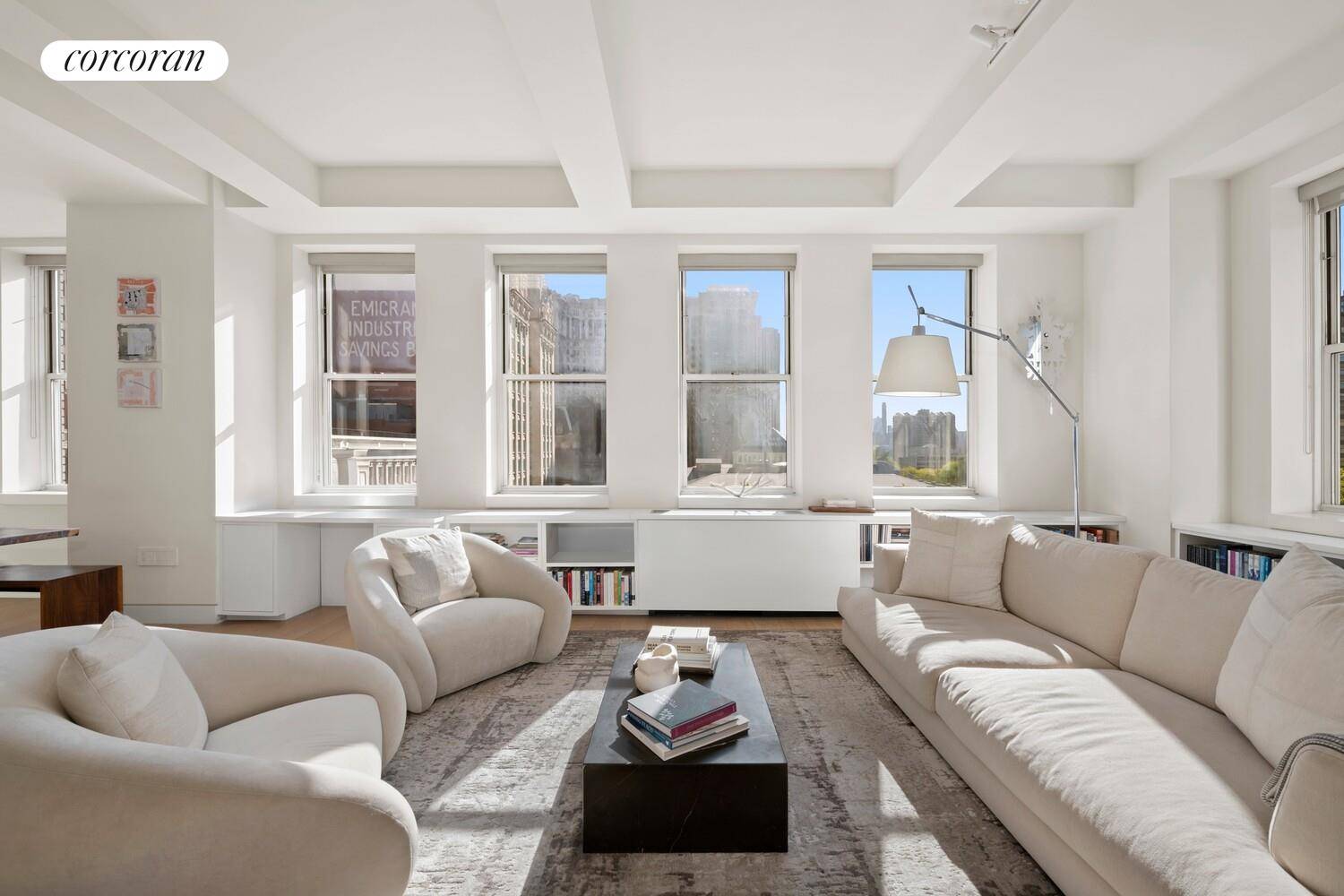 Tribeca loft proportions meet full service amenities in this sun drenched three bedroom, two bathroom condominium featuring an expansive open plan layout, sleek modern finishes, and breathtaking City Hall views ...