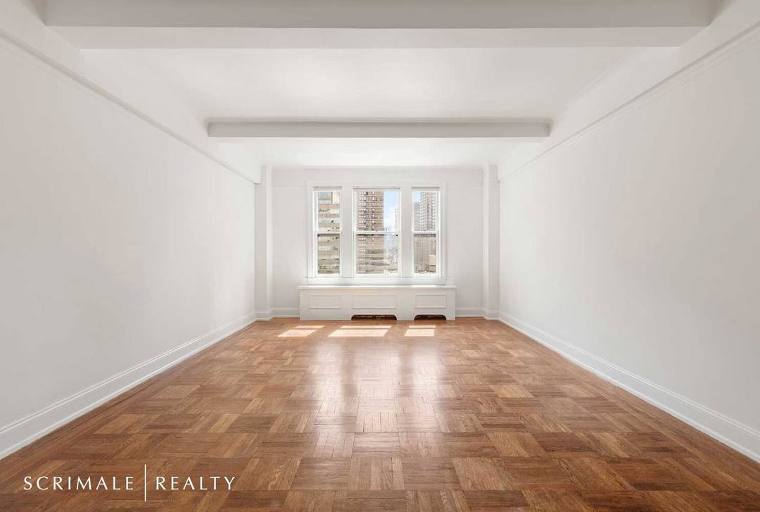 Bright and spacious, this south facing two bedroom, two bathroom apartment features a beautiful living room with high beamed ceilings and crown moldings, a large renovated kitchen, a vented washer ...