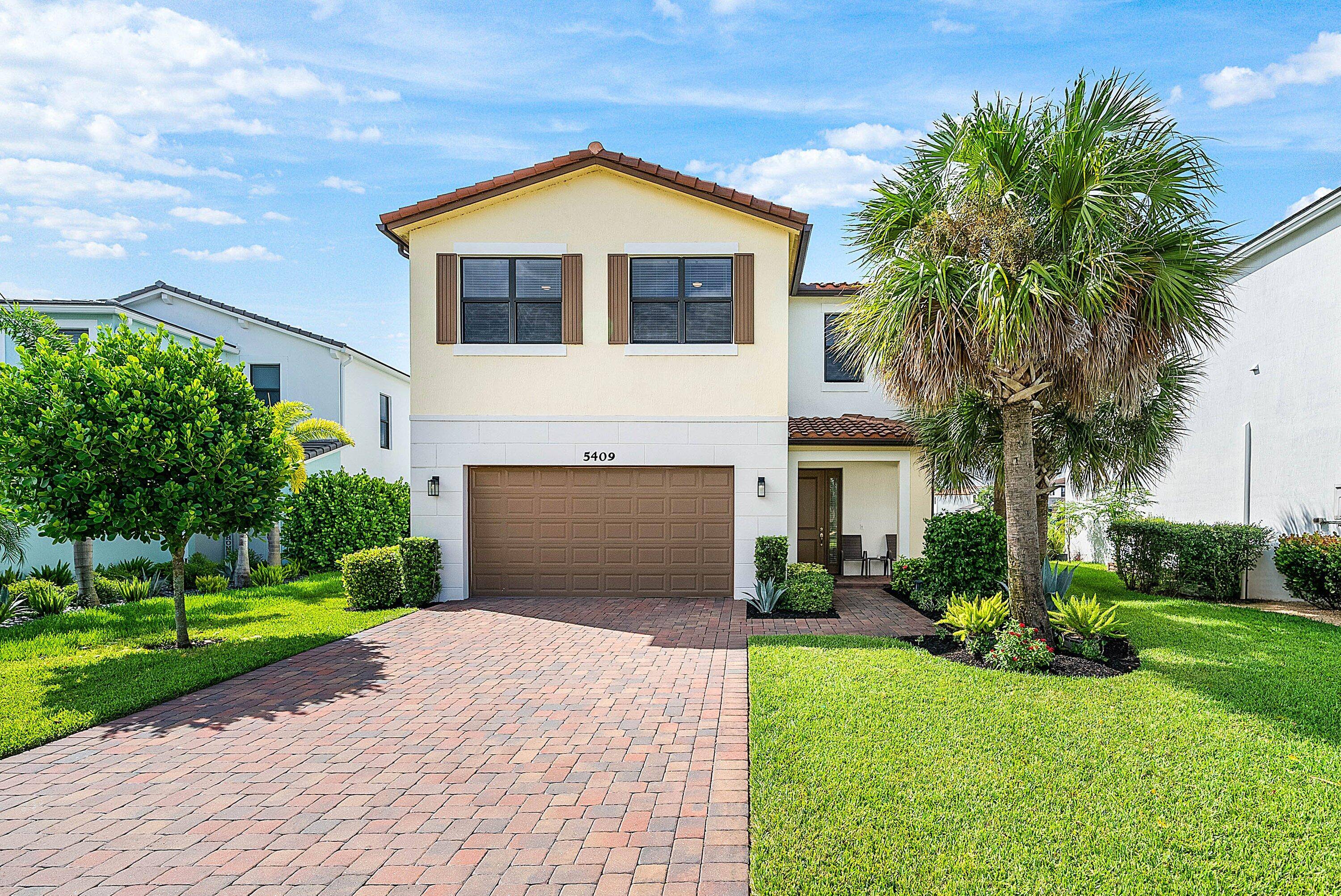 Experience elegant lakeside living in this upgraded home perfectly positioned on a premium lakefront lot in Westlake.