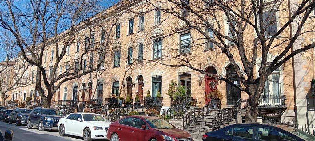 Rare opportunity to own a landmarked Colonial Revival townhouse in Harlem s historic St.