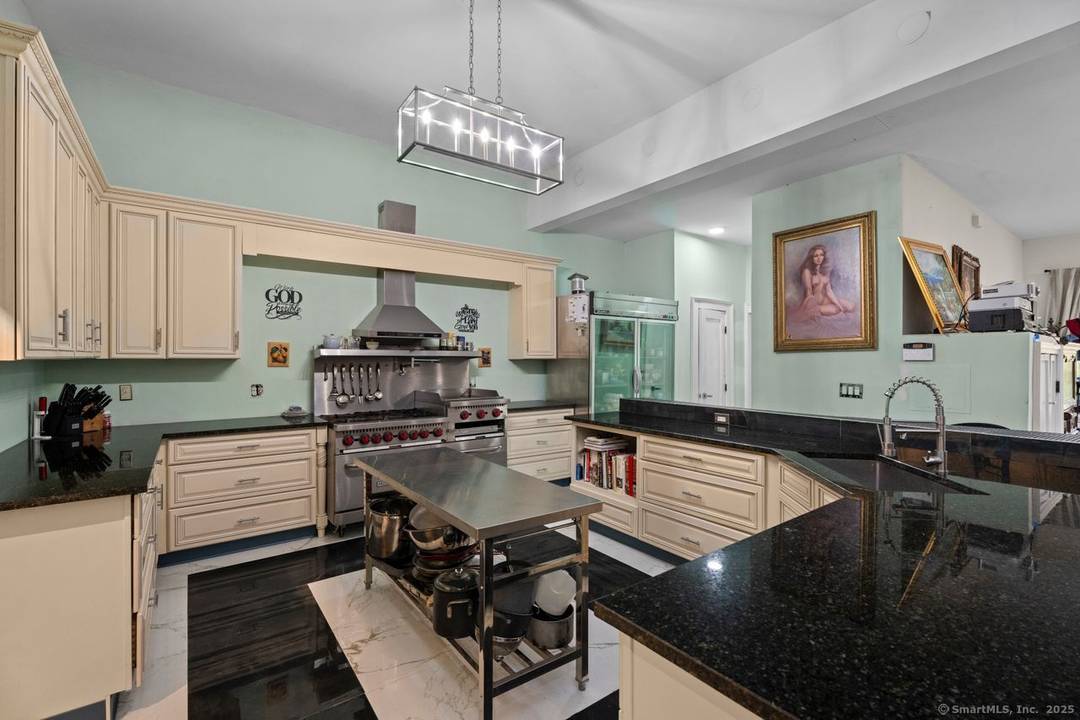 Welcome to this stunning, rarely available contemporary new construction at the end of a quiet cul de sac with partial views of Moodus Reservoir.