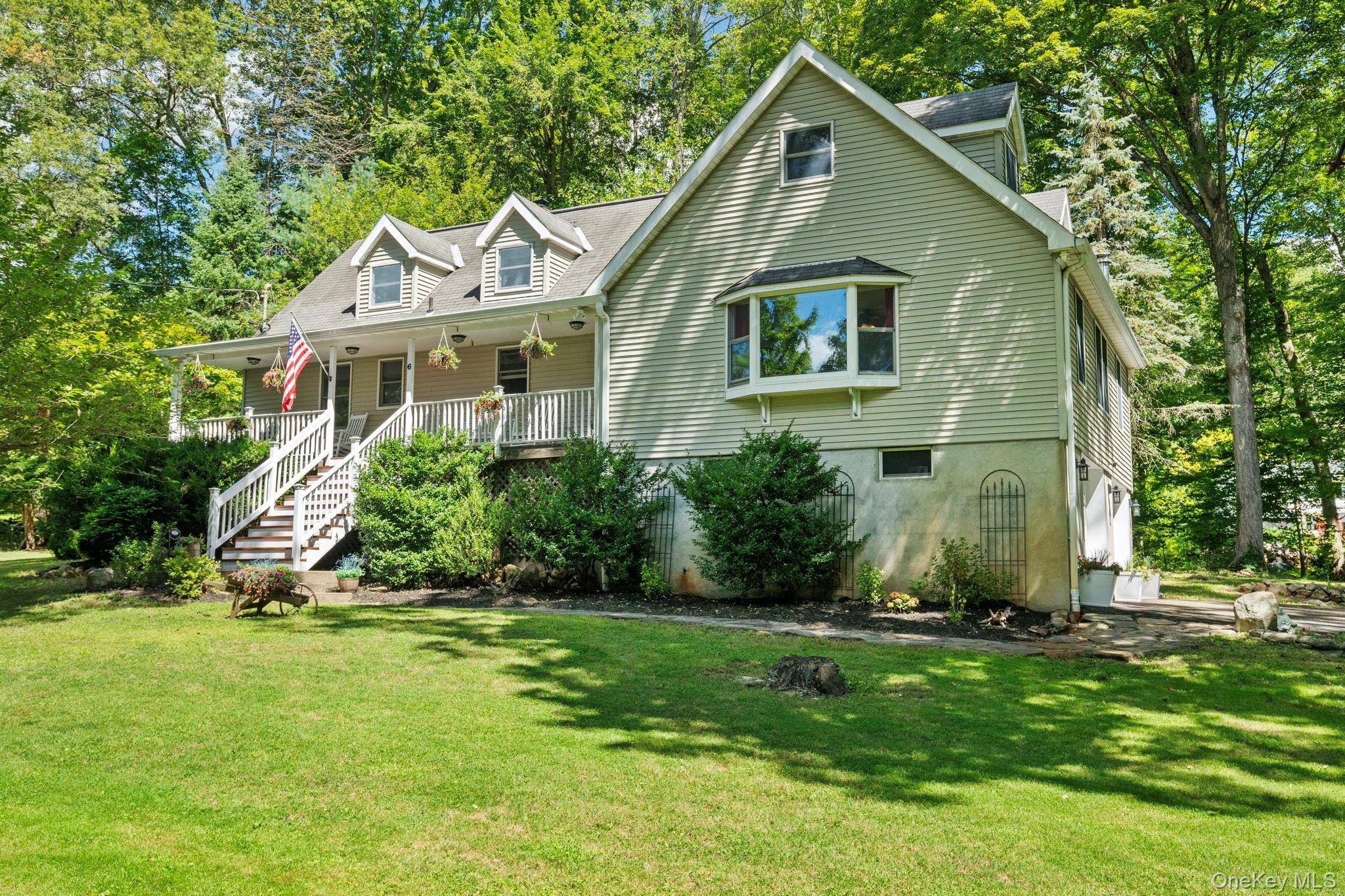 Live your dream in this beautifully updated 4 bedroom, 2 and 1 2 bathroom Cape Cod with welcoming covered front porch, a separate home office and finished lower level in ...