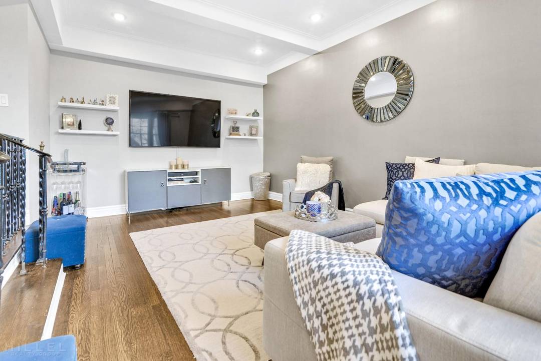 An opulent, fully renovated apartment nestled in a prime Forest Hills Gardens location.