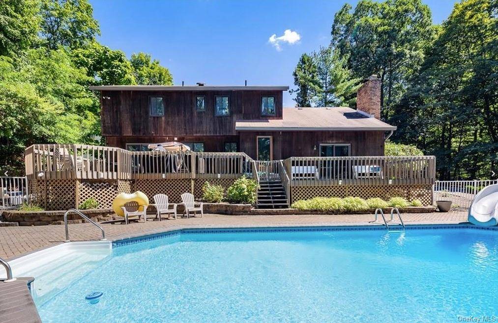 One of a kind ! Welcome to 7 Karow Ct, your dream colonial tucked away at the end of a serene Cul De Sac in Chestnut Ridge.