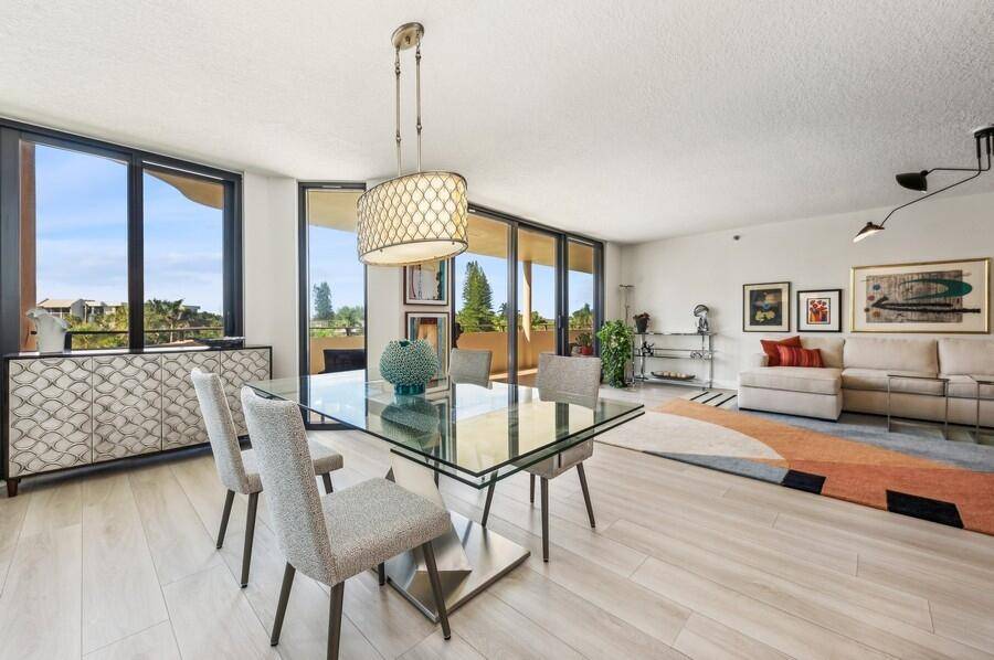 This stunning residence is located across from the beach and features an updated kitchen with gorgeous quartz counters and sleek cabinetry.