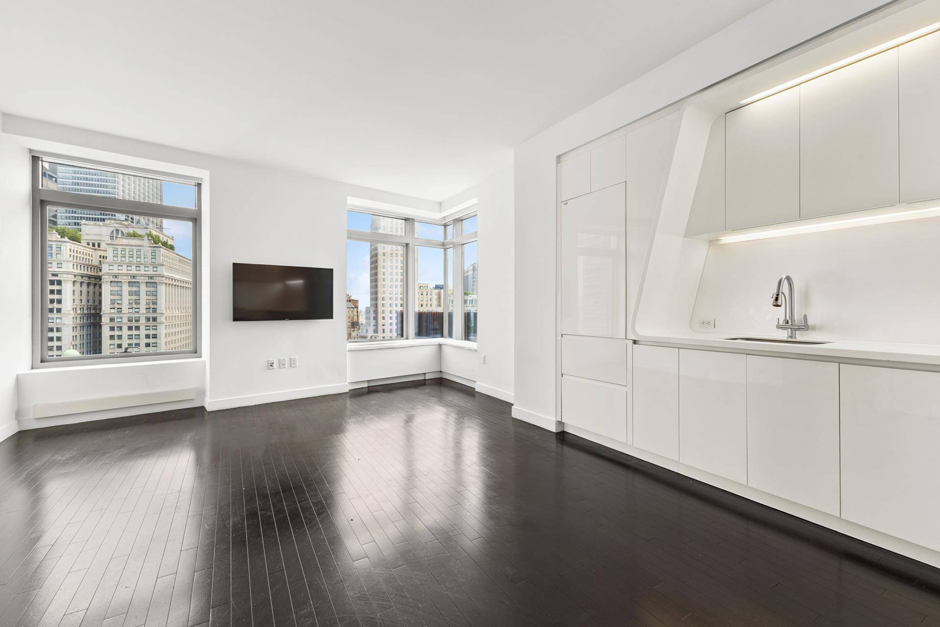 Views of 9 11 Memorial Park, Statue of Liberty, the river, city of Manhattan and beyond from every window of your residence.