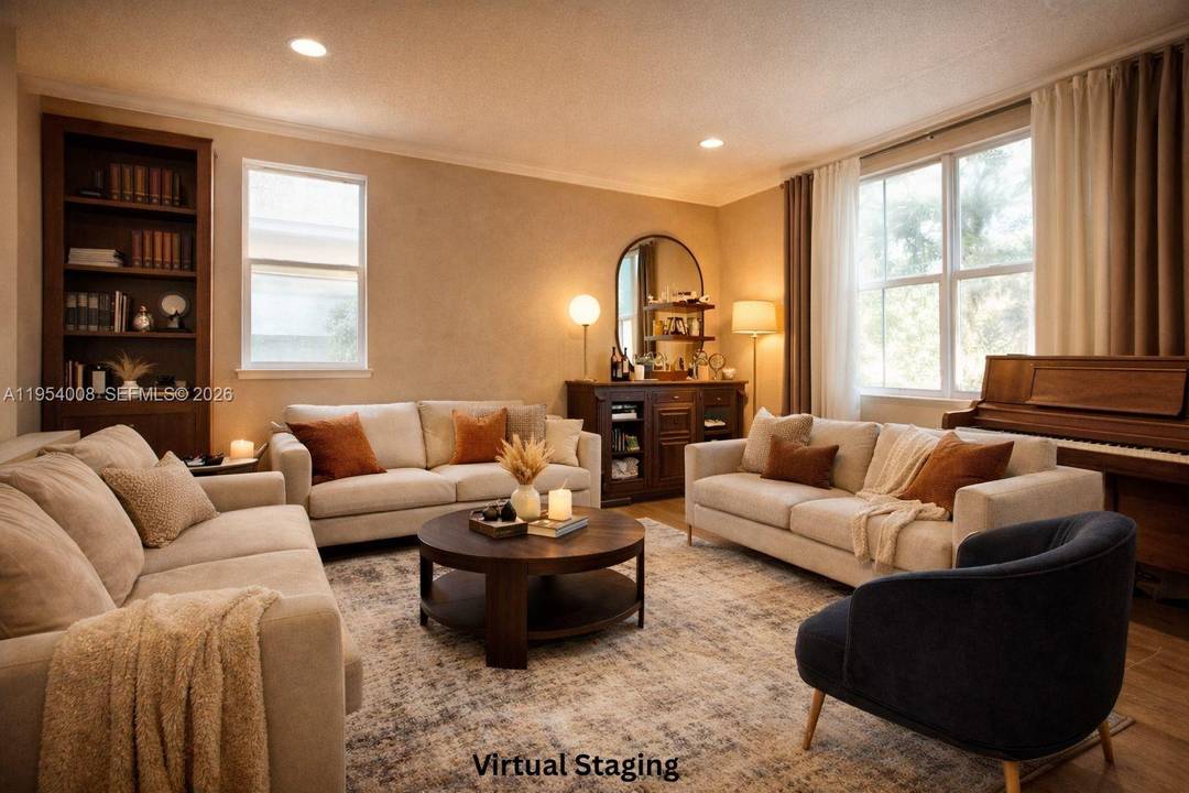 Two story home in Keys Landing featuring 4 bedrooms and 3 full baths, including a ground level suite perfect for multigenerational living or guests.