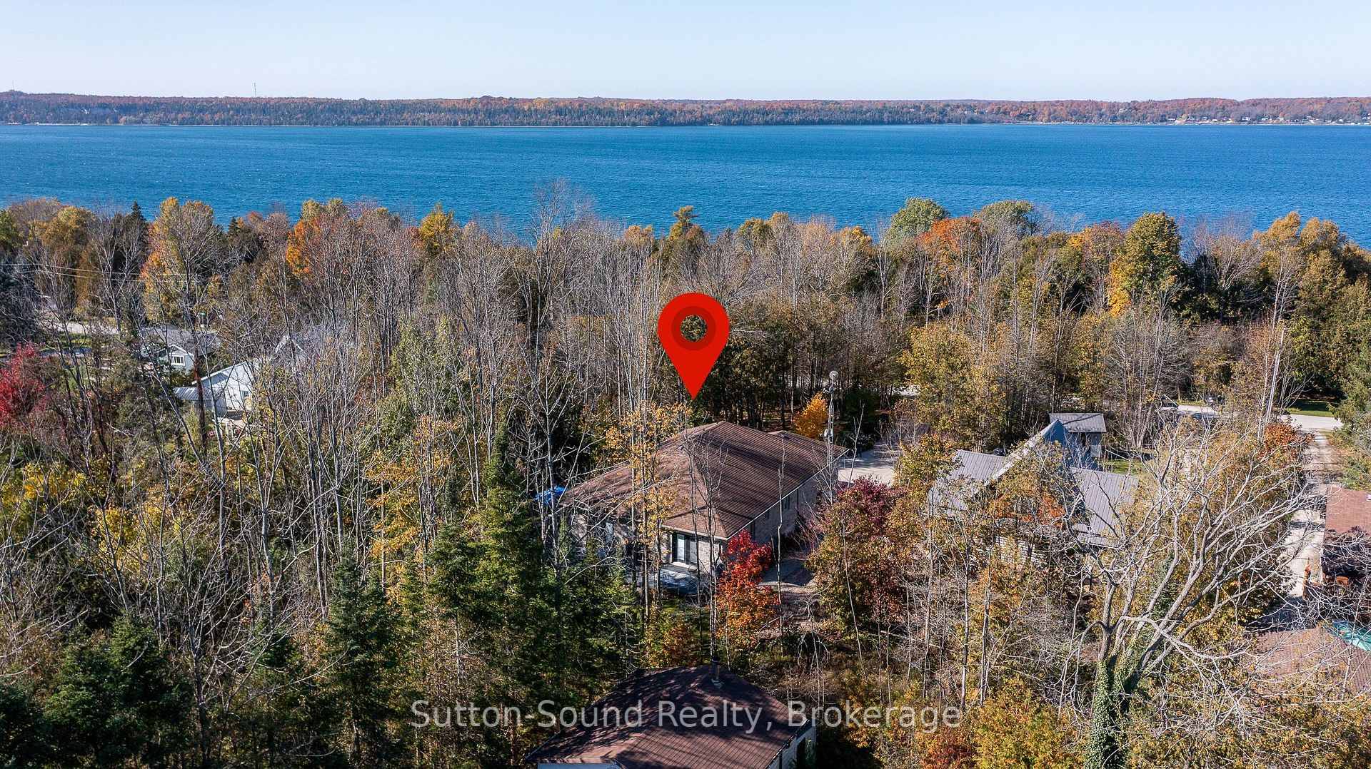 Nestled on scenic Lakeshore Road in the desirable Georgian Bluffs, this charming two bedroom, two bathroom bungalow offers the perfect blend of modern updates and tranquil living with over 3, ...