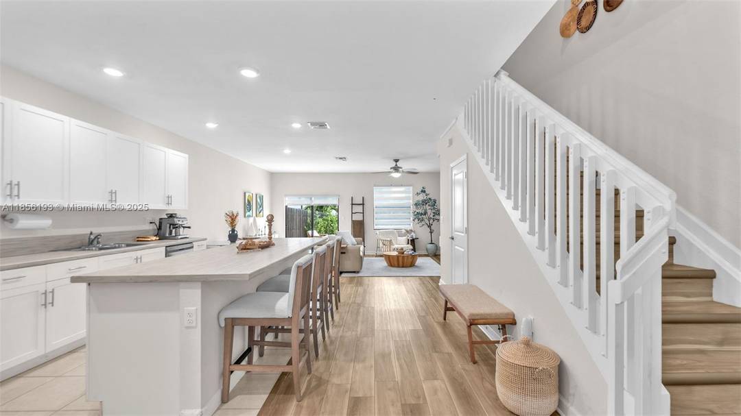 This modern twin home in the Campo Bello community offers a luxury lifestyle with its private pool, smart home features, and upscale finishes.