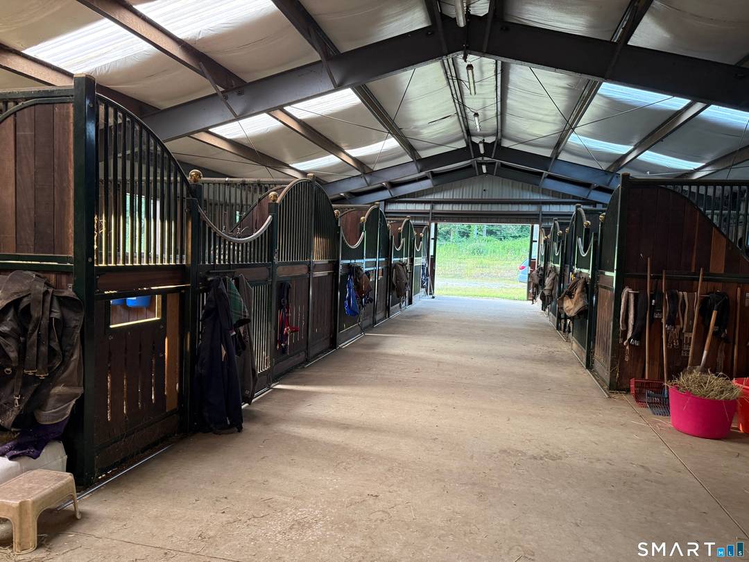 Wind Dance. Rare 61 acre equestrian and development parcel offering turnkey horse facilities and significant site potential.