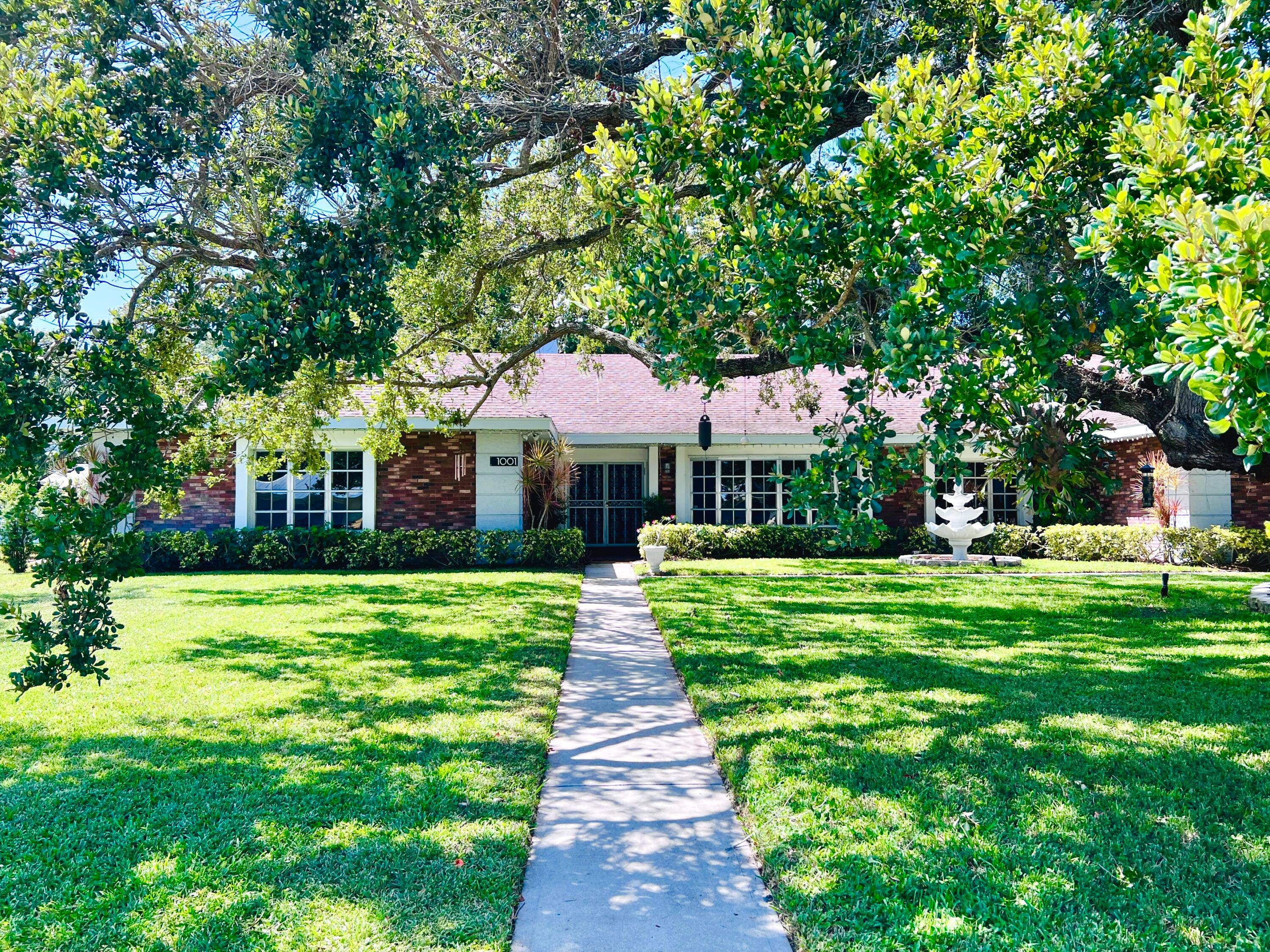Custom built by a Ft. Pierce business owner in 1984, this home is as solid as the 100 year old heritage Live Oak in the front yard.