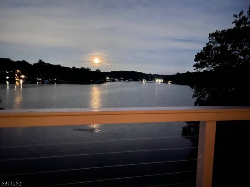 Remodeled cliffside contemporary home with open layout and wonderful stunning lake views in all directions, 140' of private lakefront, beautiful sunrise and moon views originally called sunrise cove at Hollywood ...