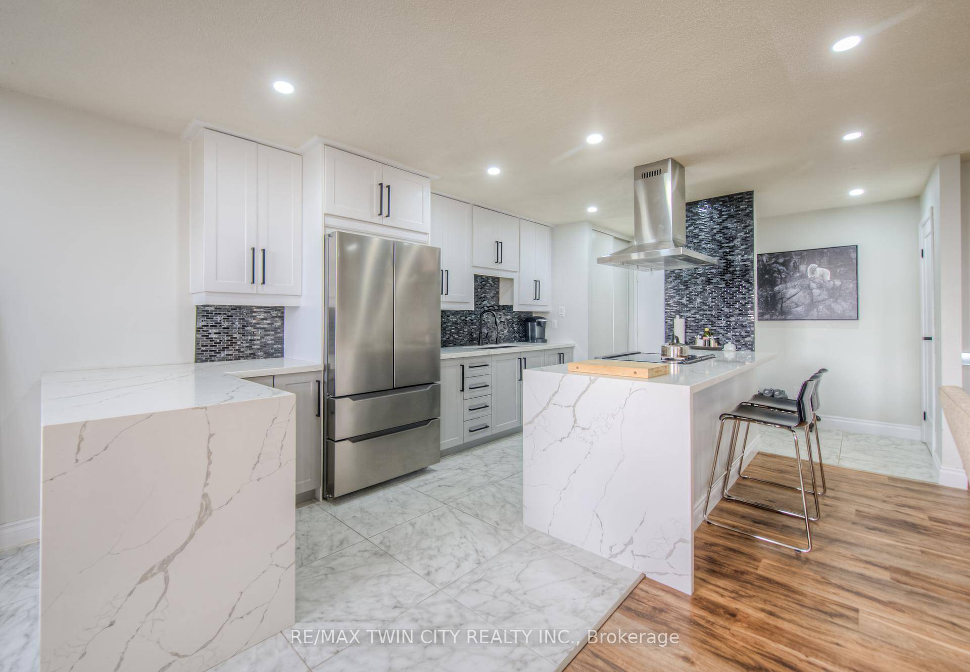 Welcome to Unit 410 at 185 Kehl Street a rare and beautifully renovated gem in Kitchener that's truly move in ready.