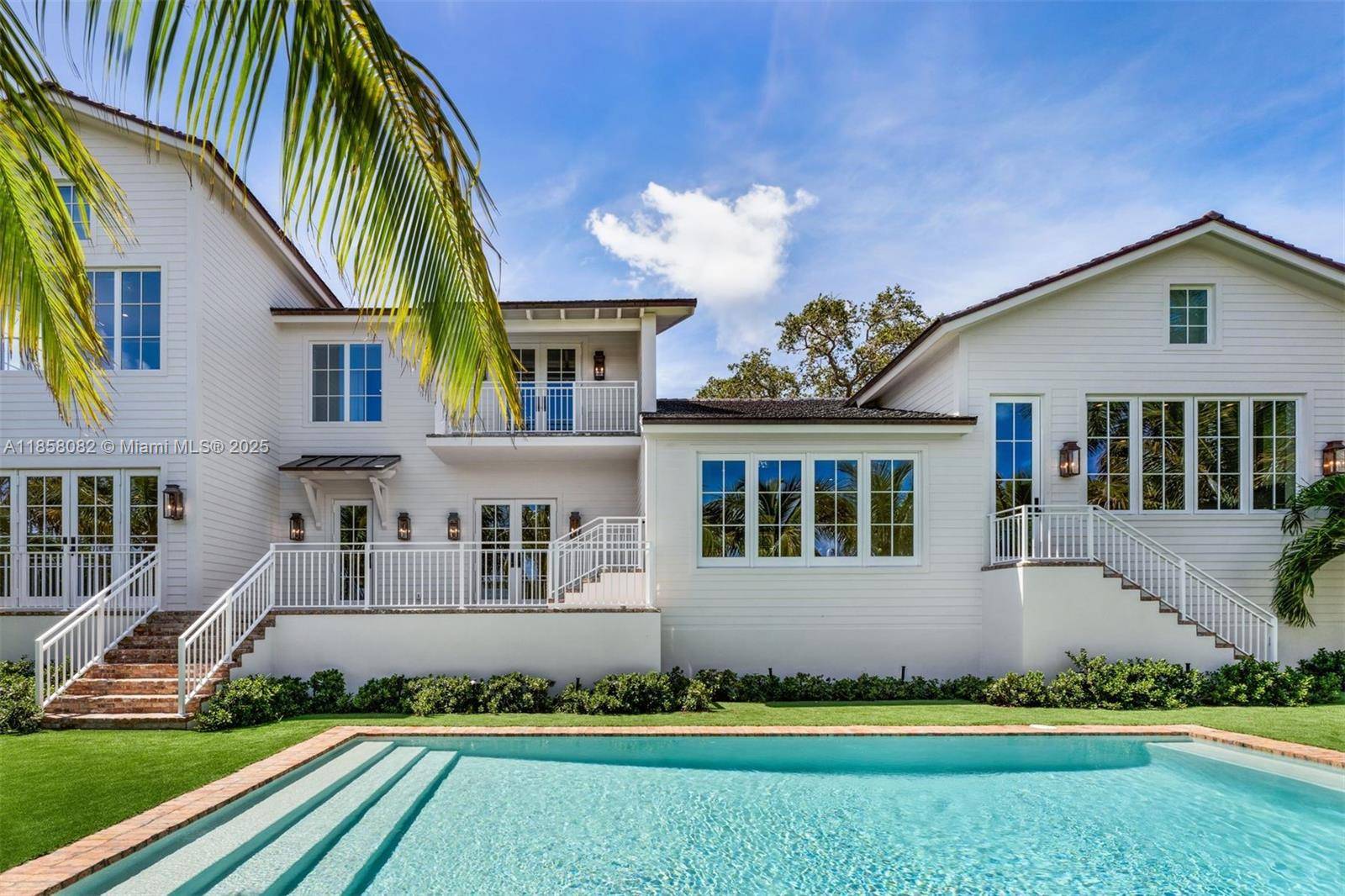 A Yachtsman s dream home totally new 2025 rebuild sits high on a 12, 000 SF direct ocean access lushly landscaped tree shaded interior lot on a quiet cul de ...