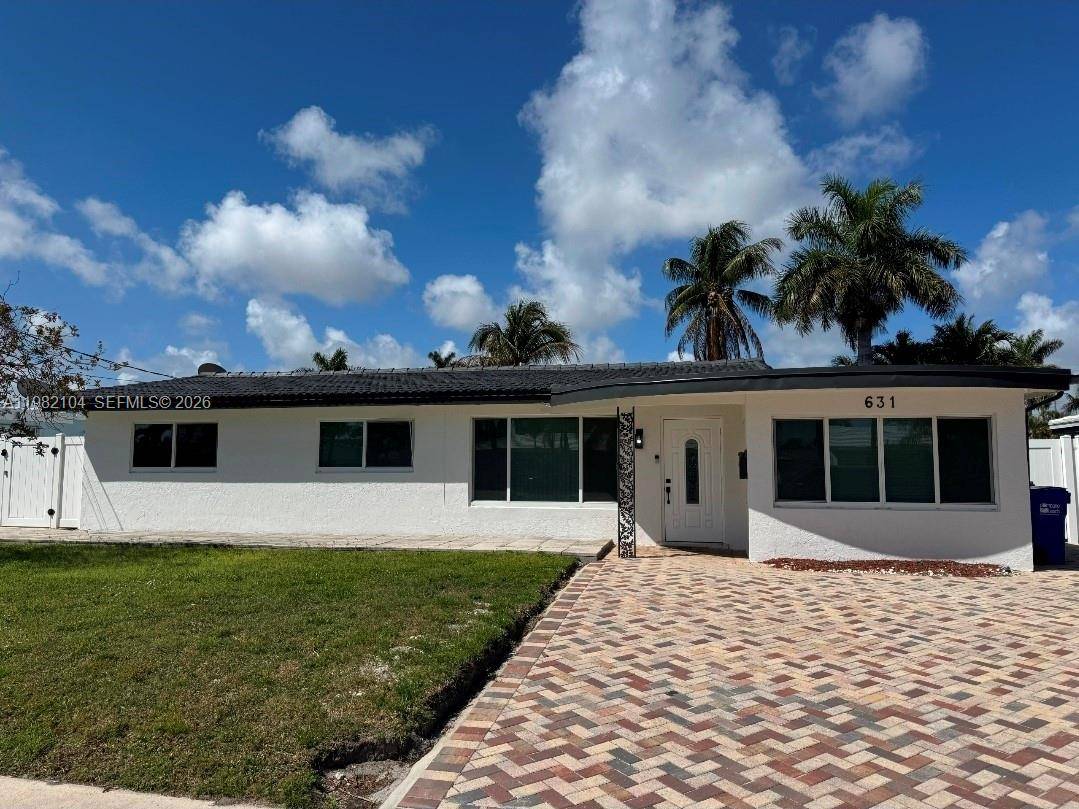 Exceptional waterfront residence completely remodeled and located in a highly desirable exclusive neighborhood with direct ocean access and breathtaking canal views.
