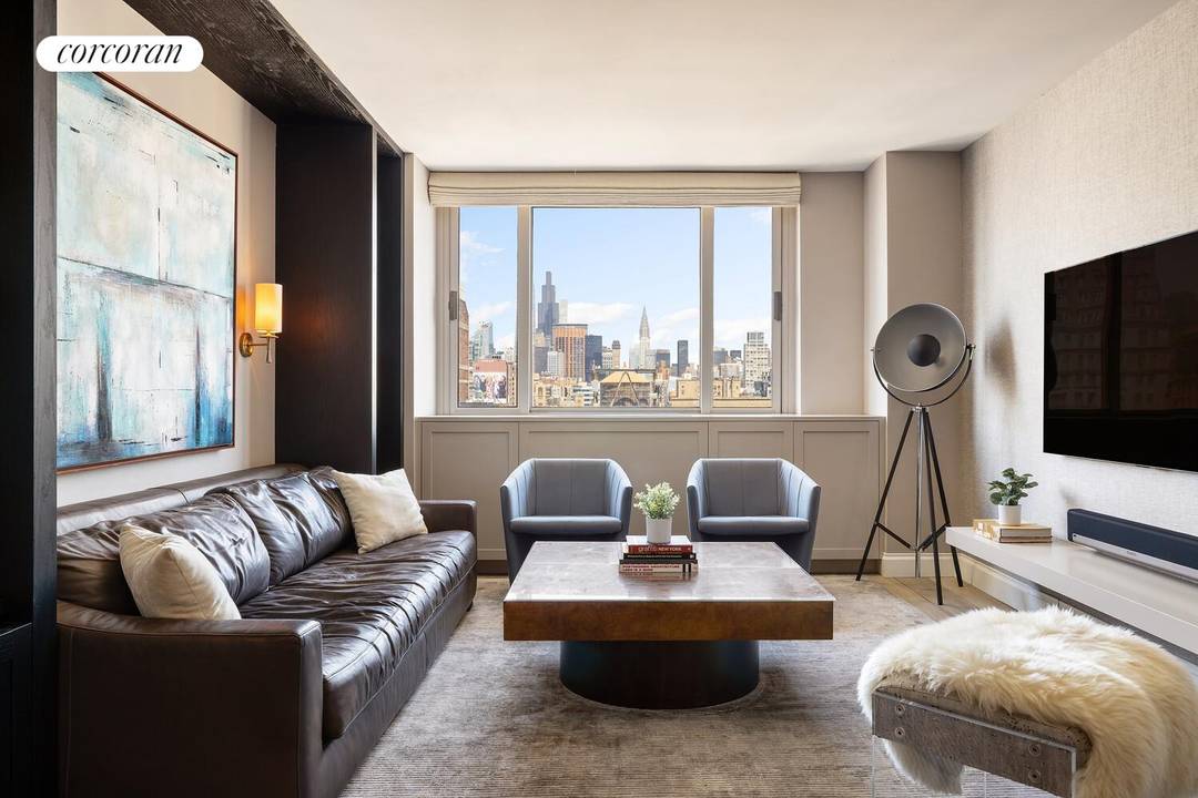 Designer Apartment Re Modeled by Black and Steel Studio, including Integrated Sonos surround sound throughout Spa inspired steam shower with digital controls Custom marble kitchen island with premium integrated appliances ...
