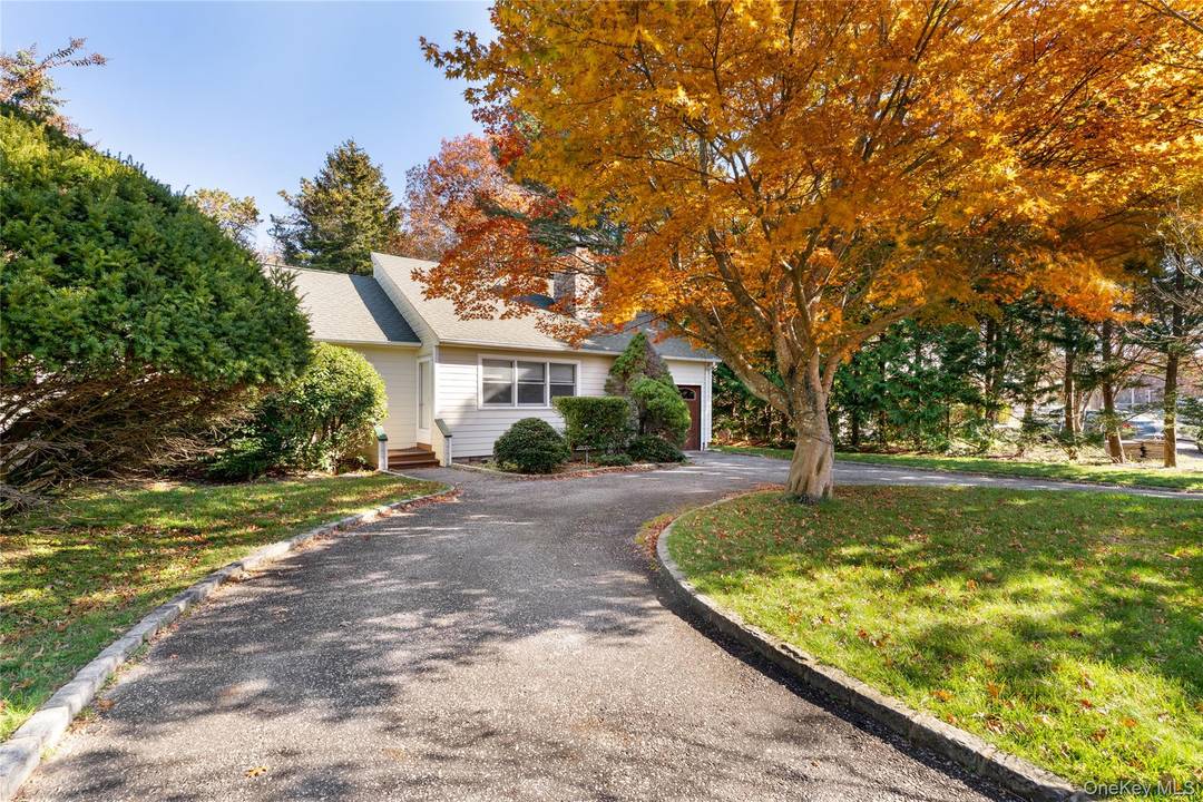 This charming house is centrally located in the village of Hampton Bays.