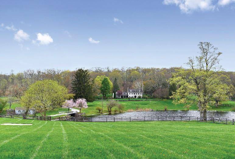 This nature lover s estate features a handsome 4 bedroom, 3.