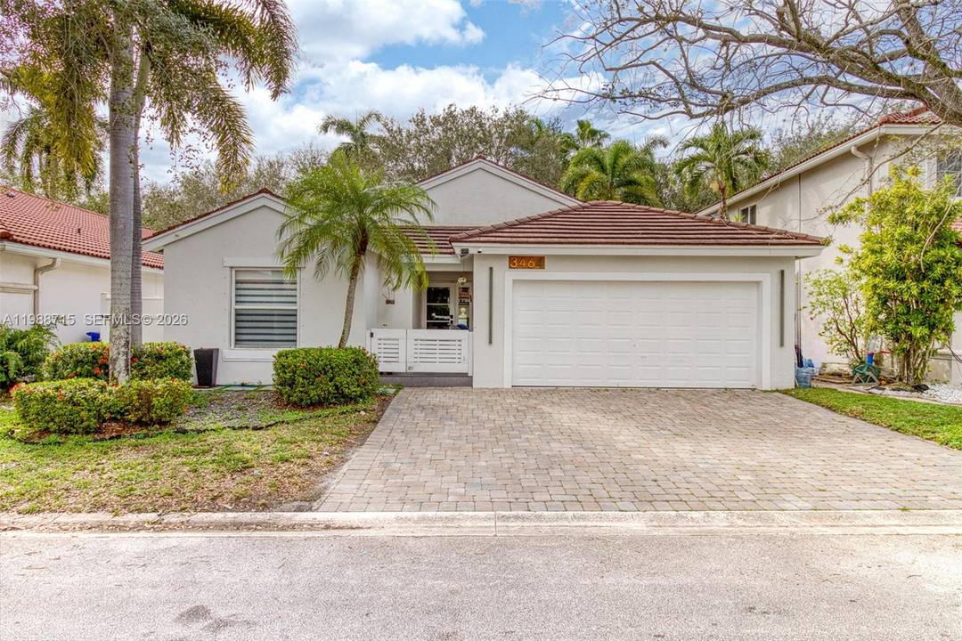 Located in Oakridge, one of Hollywood s most sought after gated communities, this beautifully renovated home offers modern living in a quiet, family oriented neighborhood known for its tree lined ...