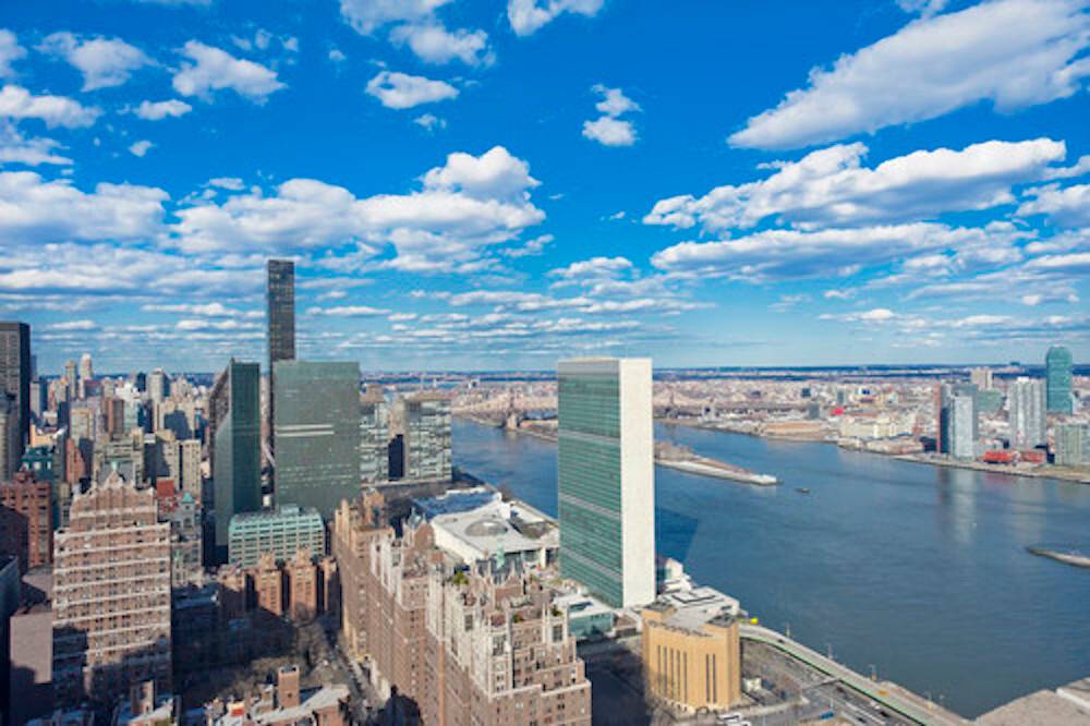 Experience both the sunrise and the sunset over the New York City skyline from the 56th floor of this spectacular 3 bedroom, 2 bath home.