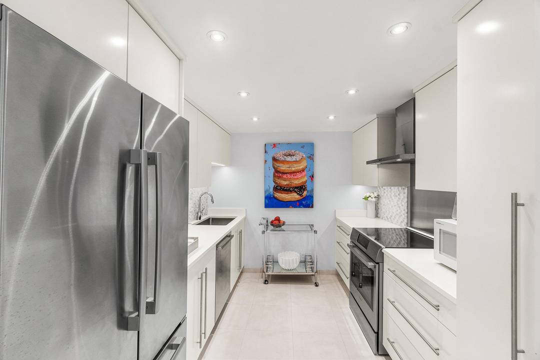 Enjoy gorgeous sunsets and tranquil living at the coveted direct ocean Sun Surf.