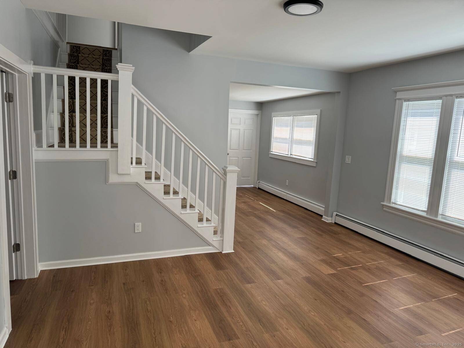 Welcome to this beautifully renovated Craftsman Cape located in the desirable North End of Bridgeport on tree lined Jewett Avenue.