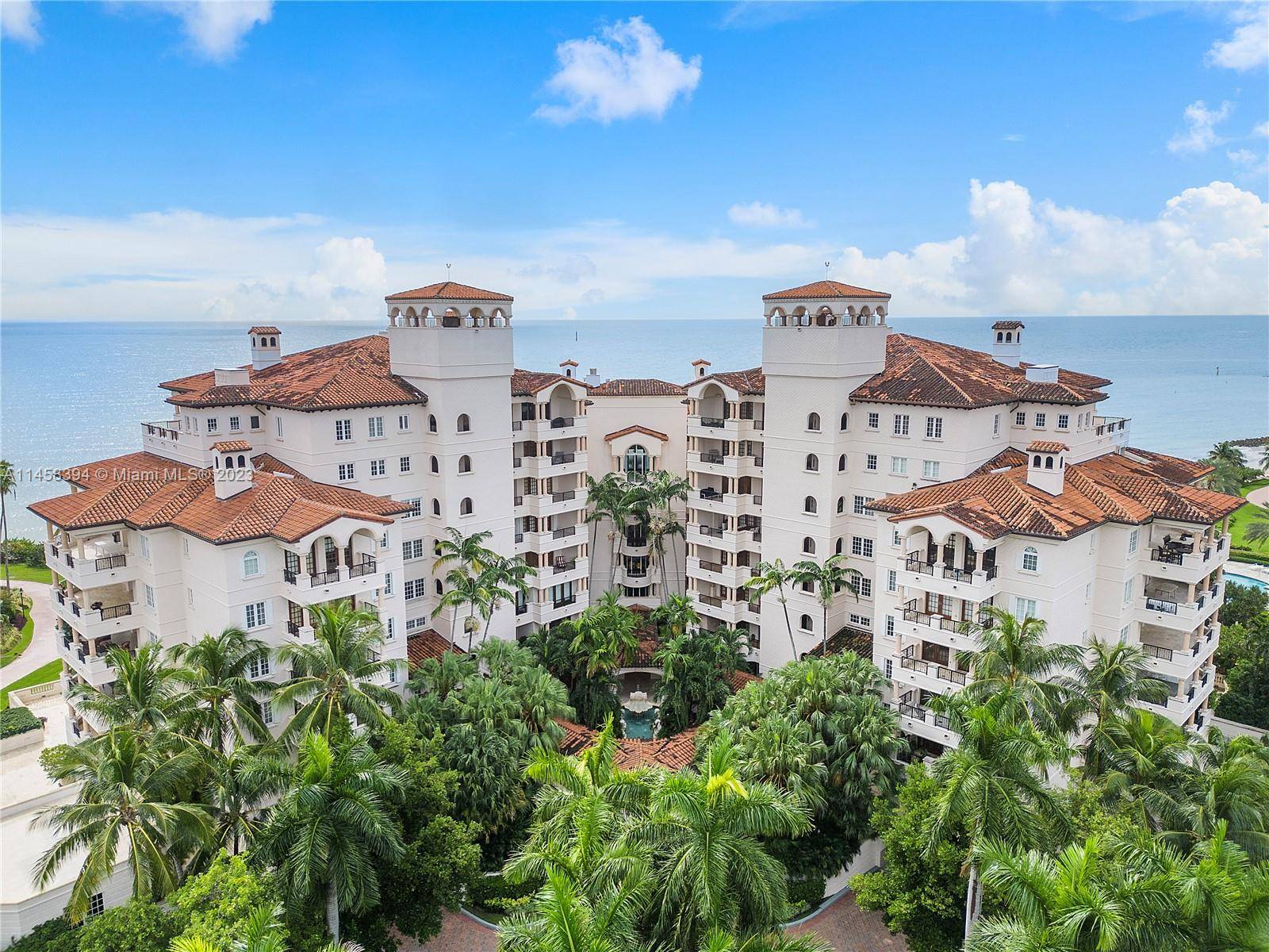 ENJOY THE ULTIMATE IN RESORT LIVING WITHIN THE PRIVATE ENCLAVE OF FISHER ISLAND !