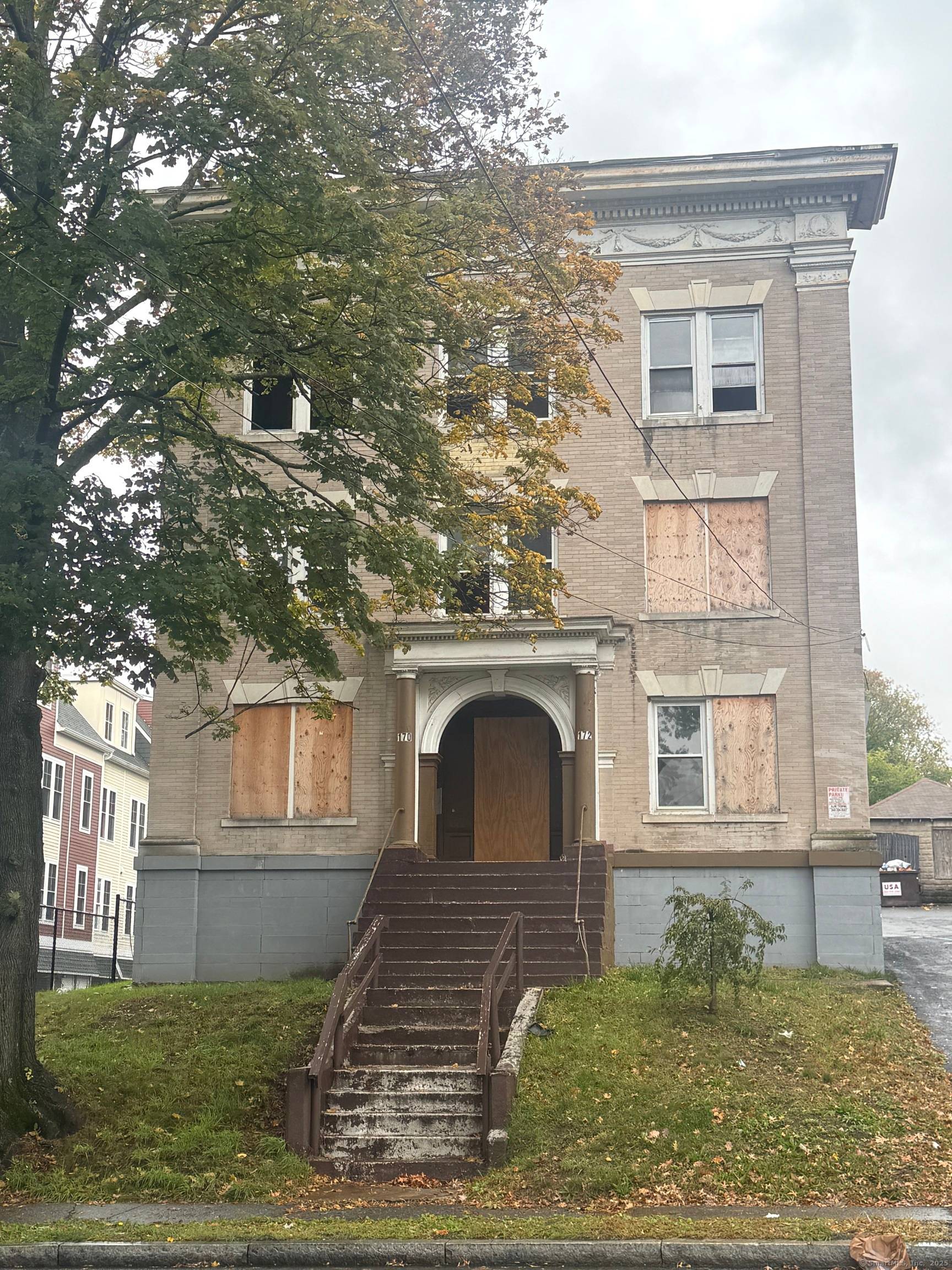 Discover an exciting opportunity with this historic building located directly across from Pope Park in Frog Hollow.