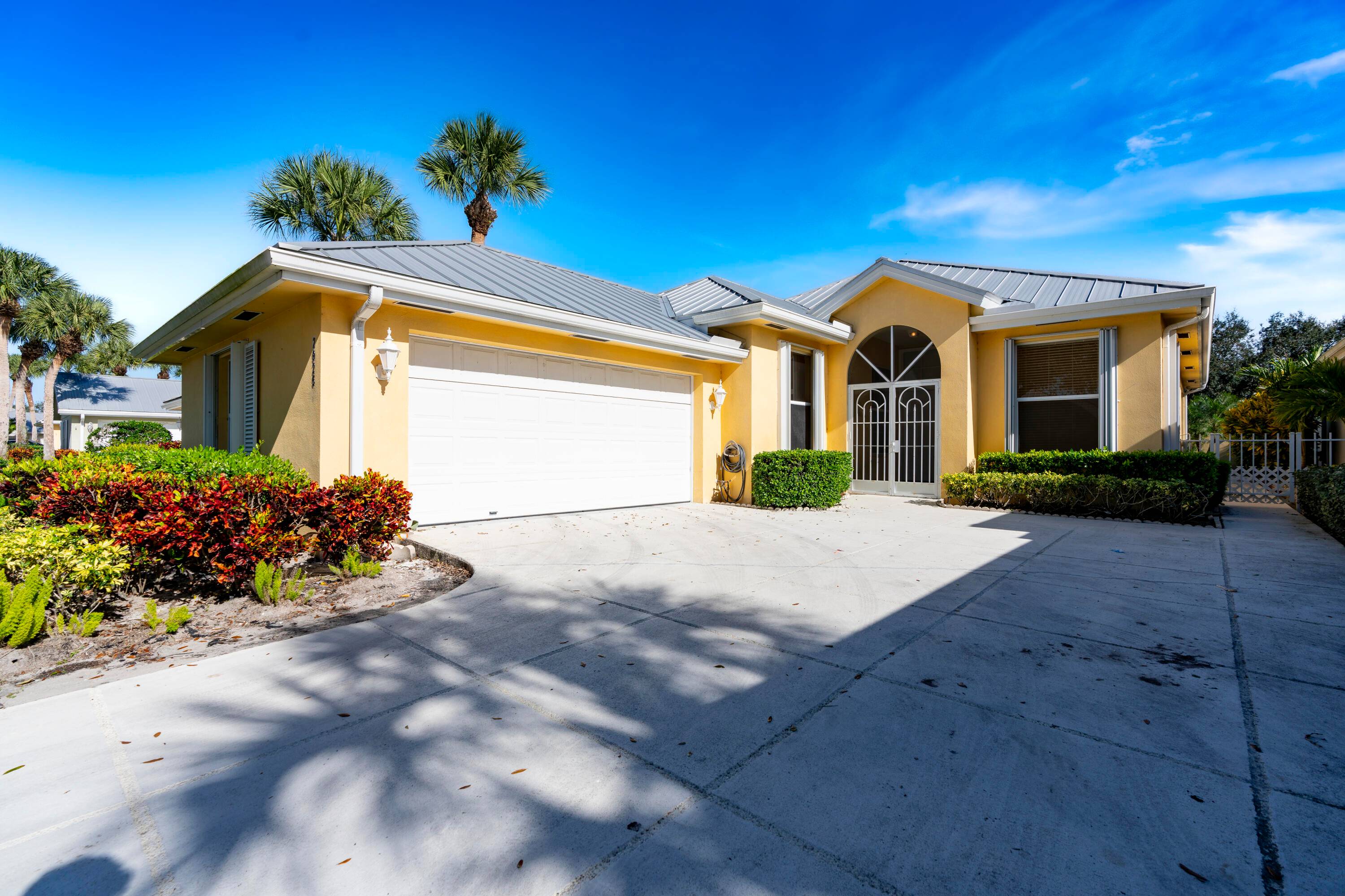 Welcome to this beautifully maintained 3 bedroom, 2 bathroom home located in the highly desirable, gated community of The Meadows in Palm City.