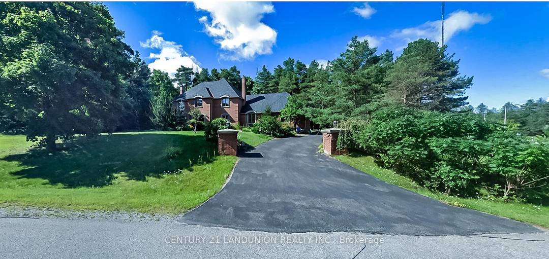A Beautifully Updated Home Nestled on Nearly 1.