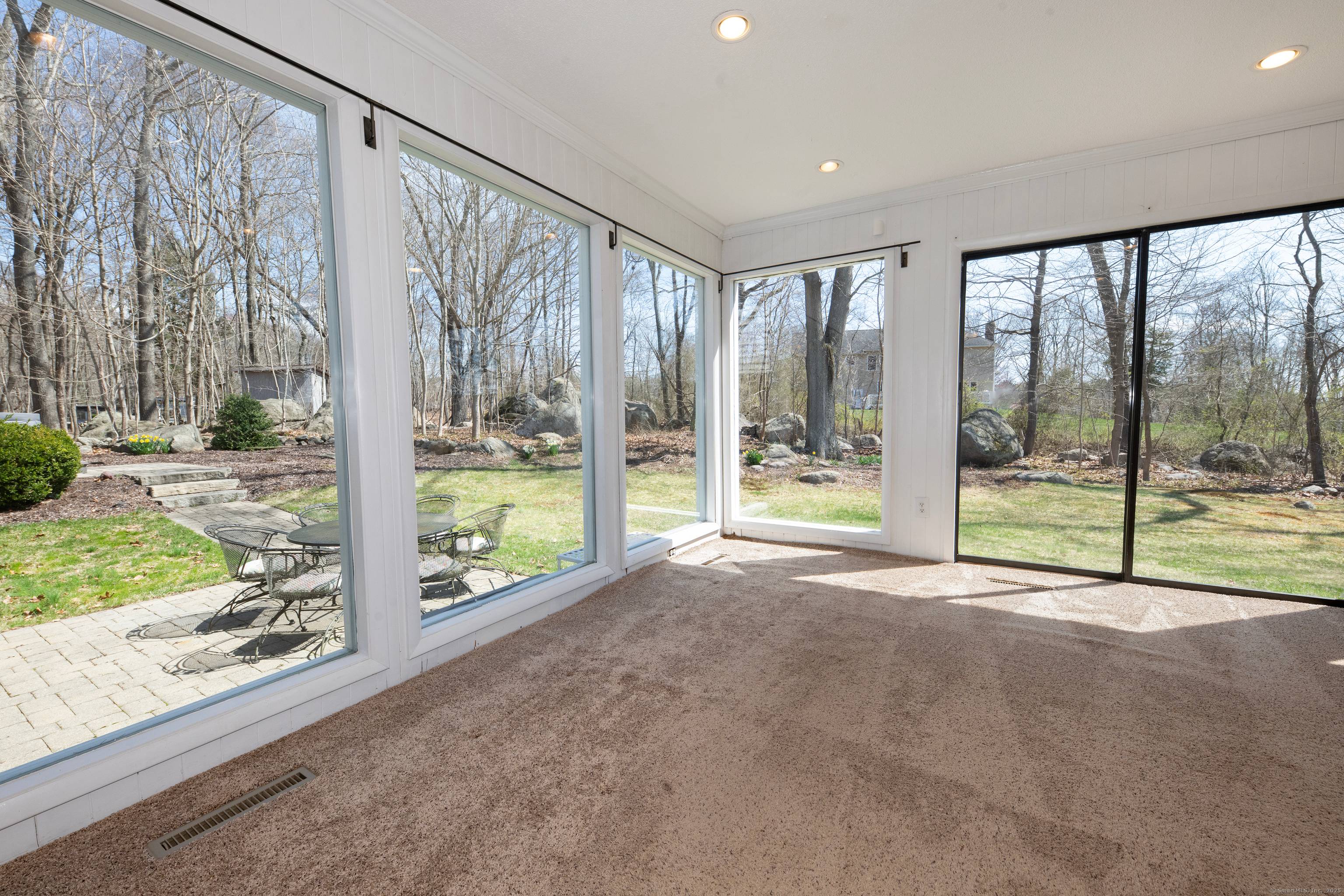 Take another look ! We've added virtually staged rooms to help you envision living in this light filled contemporary home at the end of a cul de sac.