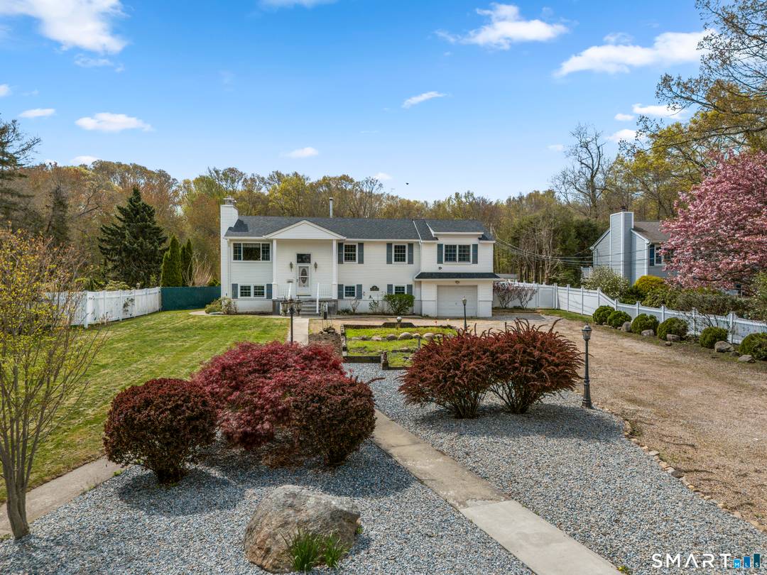 Welcome to this Beautifully maintained property offering 2200 sq ft of Living Space, Designed for Comfort and Entertaining.