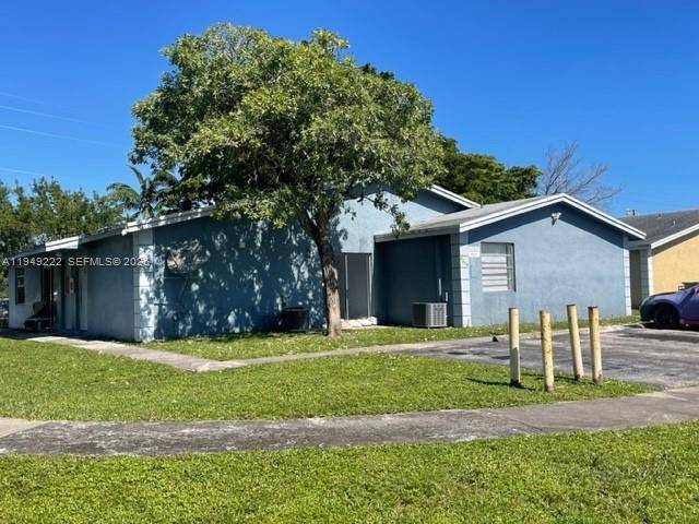 Income producing Fourplex on a corner lot at the end of a quiet dead end street with park views over Millspond Park.