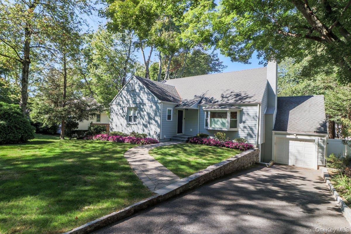 This attractive and impressive, freshly painted home sits on a quiet tree lined street.