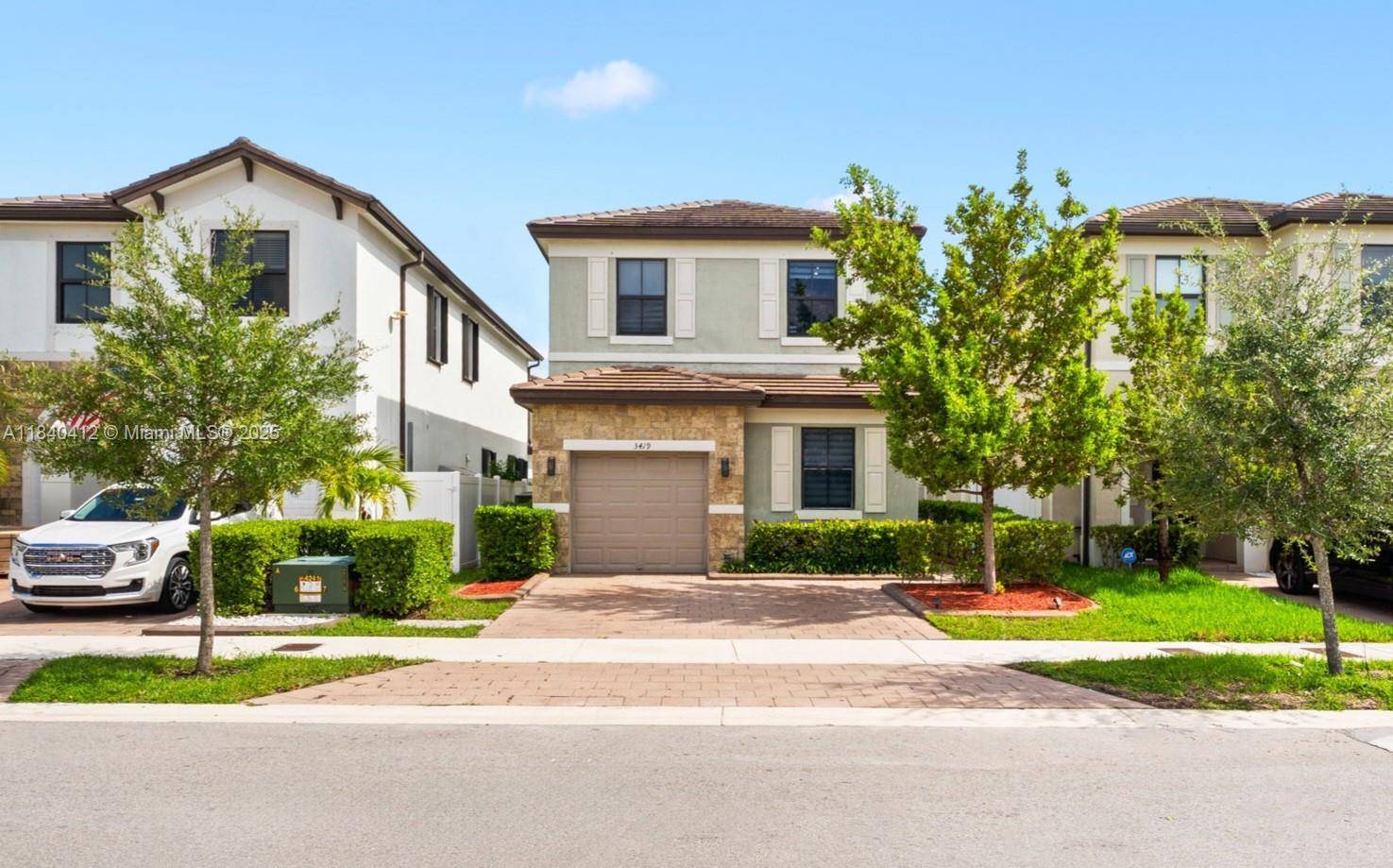 Spacious and modern 4 3 home in the gated community of Aquabella.