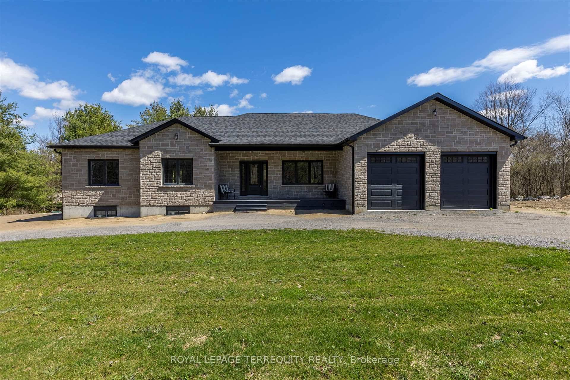 Absolutely gorgeous 2349 SqFt brick raised bungalow with high end finishes amp ; 4 spacious bedrooms.